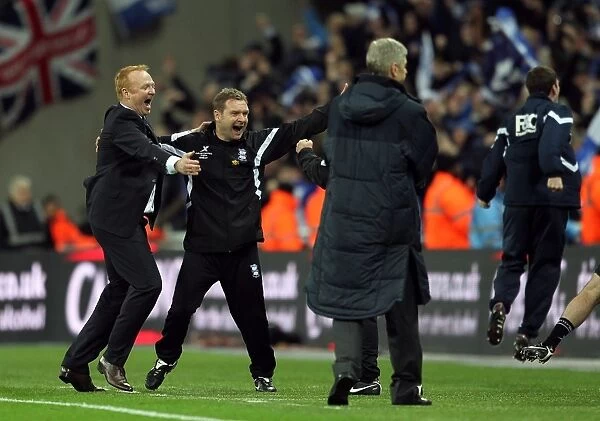 Birmingham City manager Alex McLeish and his backroom staff celebrate at the final whistle