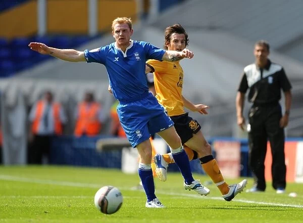 Birmingham City vs Everton: Intense Battle for the Ball - Chris Burke vs Leighton Baines (Pre-Season Friendly, 2011)