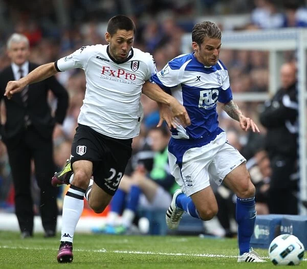 Birmingham City vs Fulham: Intense Battle Between David Bentley and Clint Dempsey in the Barclays Premier League (15-05-2011)