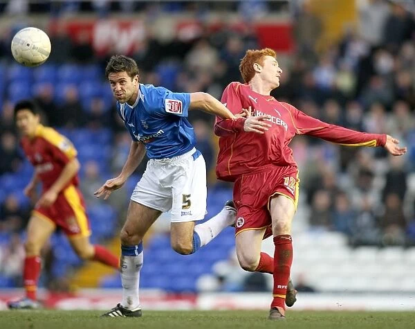 Birmingham City vs. Reading: A FA Cup Showdown - Upson vs. Kitson's Intense Battle for Ball Possession (FA Cup Round 4, 2007)