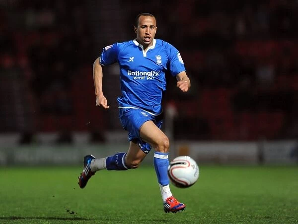Birmingham Citys Andros Townsend with the ball during the npower Championship match at the Keepmoat Stadium, Doncaster