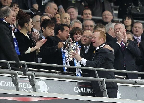 Birmingham City's Carling Cup Triumph: McLeish and Yeung Celebrate Victory with the Trophy