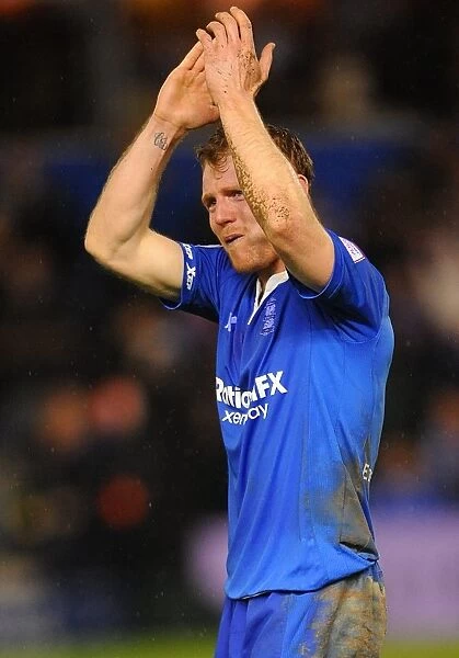 Birmingham City's Chris Burke Bids Farewell: A Dejected Moment at St. Andrew's After Playoff Semi-Final Defeat vs. Blackpool (May 2012)