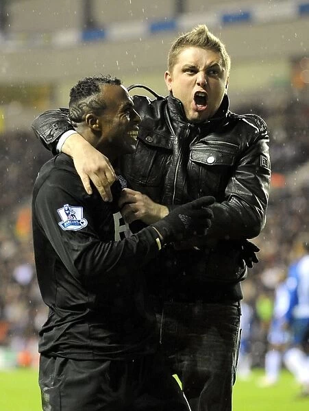 Birmingham City's Christian Benitez Jubilantly Celebrates Second Goal with Ecstatic Fan (05-12-2009 vs. Wigan Athletic, DW Stadium)