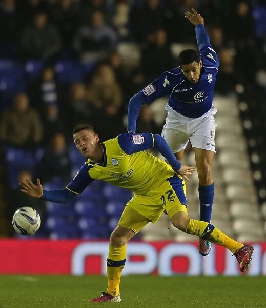 Birmingham City's Curtis Davies Outmuscles Connor Wickham: A Headed Duel in the Npower Championship (Birmingham City vs Sheffield Wednesday, St. Andrew's - February 19, 2013)