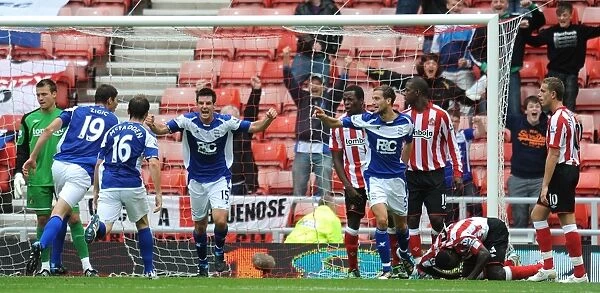 Birmingham City's Glory: Johnson and Dann Celebrate Historic Second Goal Against Sunderland in Premier League (14-08-2010)