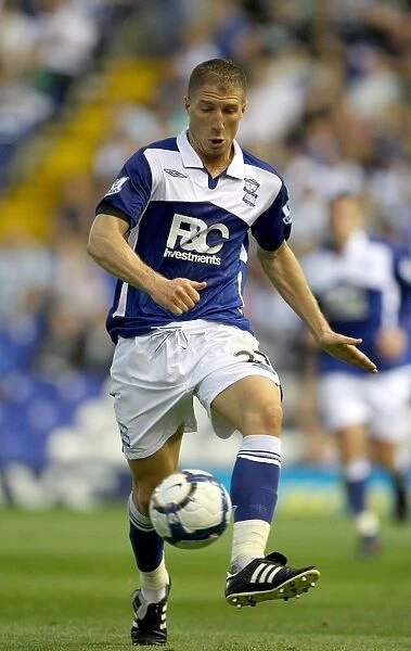 Birmingham City's Gregory Vignal in Thrilling Action Against Portsmouth (2009)