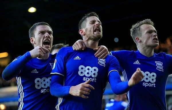 Birmingham City's Lukas Jutkiewicz Scores First Goal: Celebrating with Gardner and Kieftenbeld in Sky Bet Championship Match against Fulham at St. Andrews