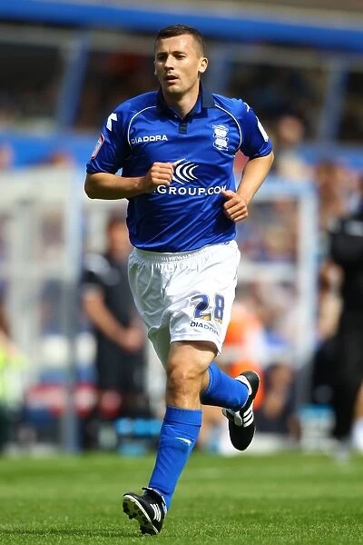 Birmingham City's Paul Caddis in Action: Npower Championship Clash Against Peterborough United at St. Andrew's (September 1, 2012)