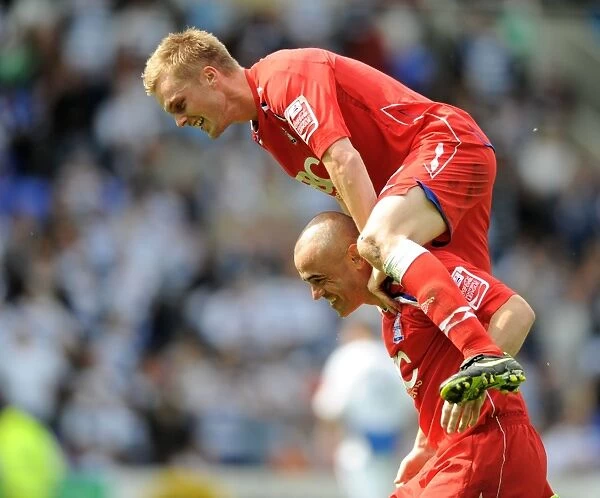 Birmingham City's Promotion Triumph: Carr and O'Connor Celebrate atop Madejski Stadium (2009)
