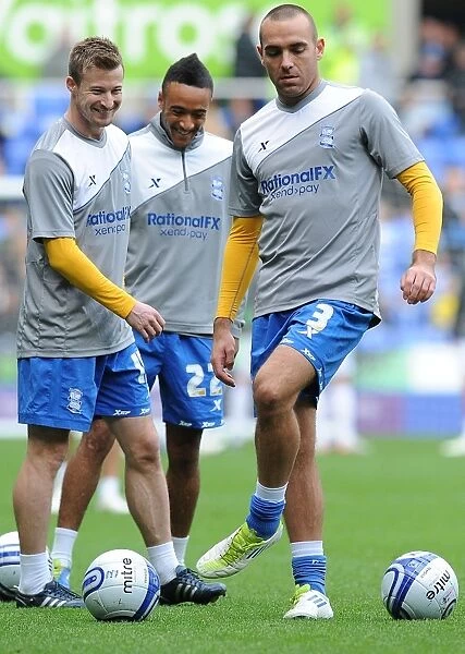 Birmingham City's Wade Elliott, Nathan Redmond, and David Murphy at Madejski Stadium (06-11-2011)