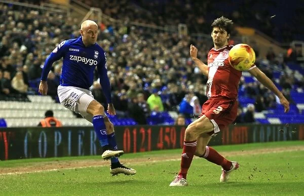 Birmingham's Cotterill Battles Past Middlesbrough's Friend for a Cross in Sky Bet Championship Clash