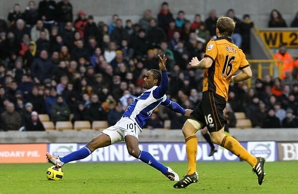 Cameron Jerome's Sliding Shot at Molineux: A Moment from Birmingham City's Barclays Premier League Clash with Wolverhampton Wanderers (December 12, 2010)
