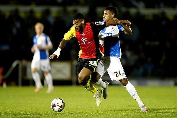 Capital One Cup: Birmingham City vs. Bristol Rovers - Intense Tackle Battle between Davis and Montano
