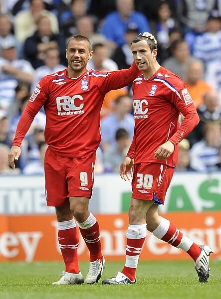 Celebrating the First Goal: Fahey and Phillips Unforgettable Moment at Madejski Stadium (03-05-2009)