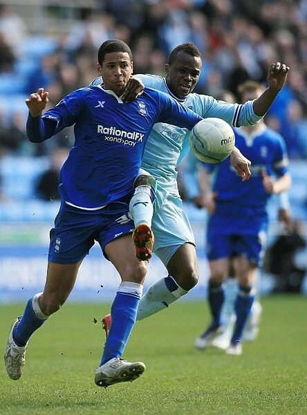 Championship Showdown: Coventry City vs. Birmingham City at Ricoh Arena (10-03-2012) - Clash between Alex Nimely and Curtis Davies