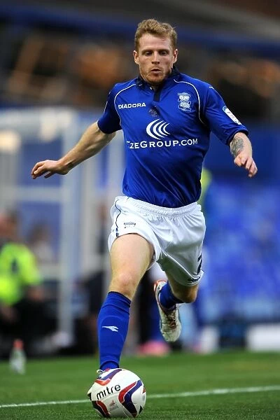 Chris Burke in Action: Thrilling Capital One Cup Clash between Birmingham City and Barnet at St. Andrew's (August 14, 2012)