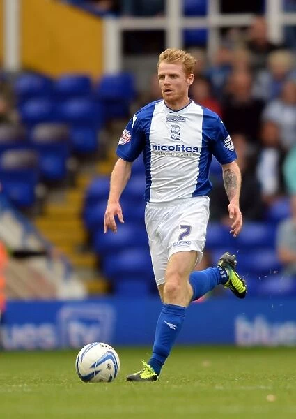 Chris Burke vs Brighton & Hove Albion: Intense Face-Off in Birmingham City's Sky Bet Championship Match at St. Andrew's (17-08-2013)