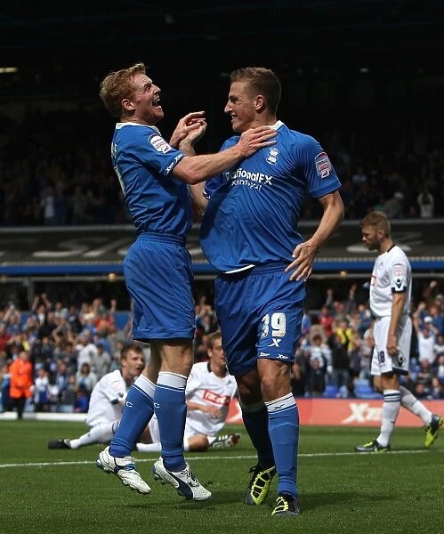Chris Wood and Chris Burke's Jubilant Moment: Birmingham City's First Goal Against Disappointed Millwall (Npower Championship, September 11, 2011)