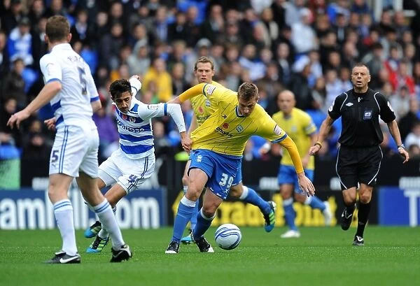 Chris Wood vs. Jem Karacan: A Football Battle for Supremacy in Birmingham City's Npower Championship Clash at Reading