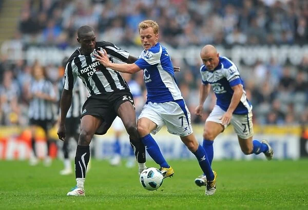 Clash at St. James Park: Larsson vs Ameobi in Premier League Battle (Birmingham City vs Newcastle United, 07-05-2011)