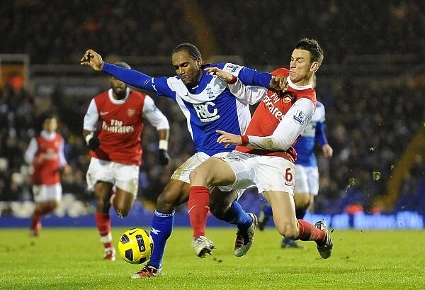 Clash of Titans: Koscielny vs Jerome in Birmingham City vs Arsenal Premier League Showdown (01-01-2011)