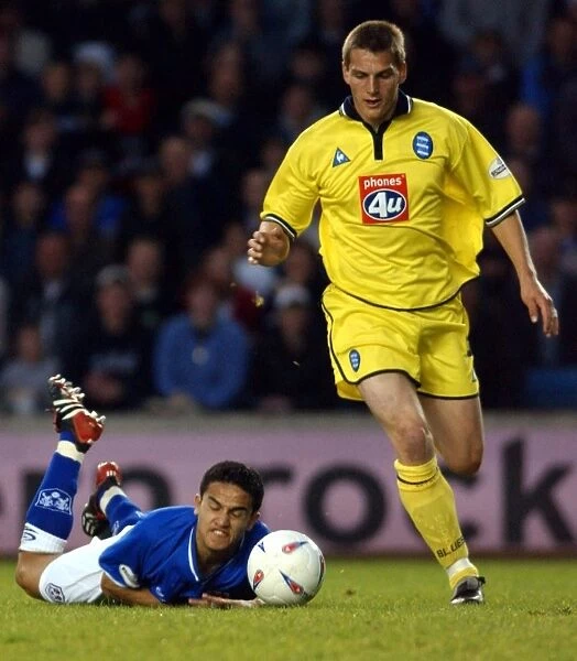 Darren Purse Outmuscles Tim Cahill in Birmingham City's Intense Playoff Semi-Final Clash against Millwall (02-05-2002)