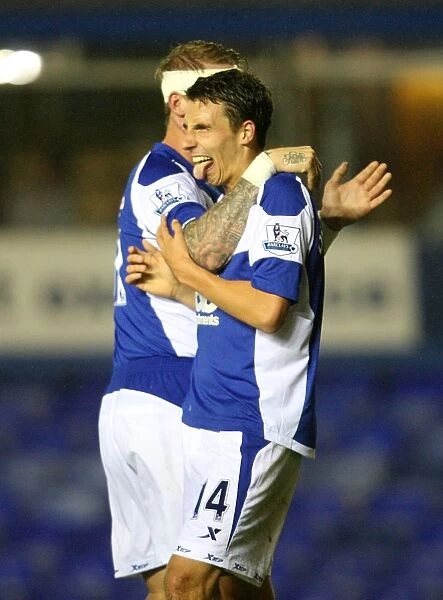 Derbyshire and O'Connor: Birmingham City's Unstoppable Duo Celebrate Third Goal in Carling Cup Victory Against Rochdale