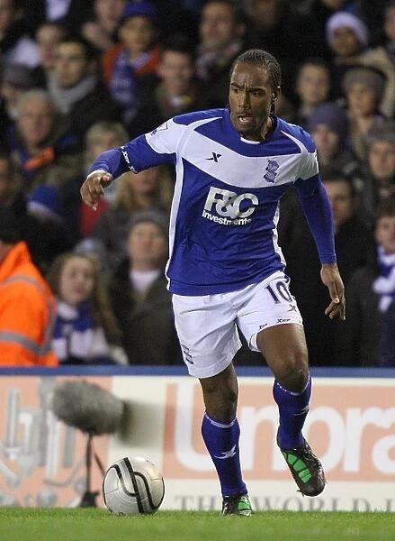 Determined Strike: Birmingham City's Cameron Jerome Scores in Carling Cup Semi-Final Against West Ham United