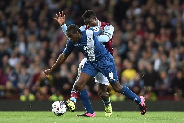 Intense Clash: Micah Richards vs. Clayton Donaldson in Aston Villa vs. Birmingham City Capital One Cup Match