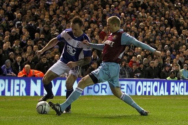 Intense Rivalry: Birmingham City vs. West Ham United in Carling Cup Semi-Final Showdown (January 2011)