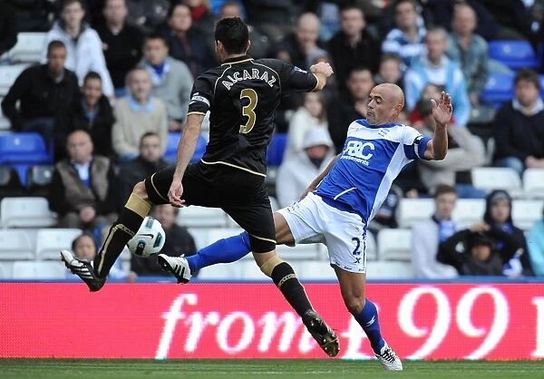 Intense Rivalry: Carr vs. Alcaraz - Battle for the Ball, Birmingham City vs. Wigan Athletic (Premier League, September 25, 2010)