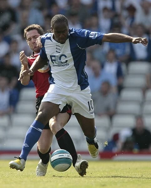 Intense Rivalry: David Dunn vs. Cameron Jerome Battle for Ball in Birmingham City vs. Blackburn Rovers (Premier League, St. Andrew's, 11-05-2008)