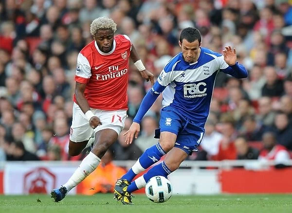 Intense Rivalry: Fahey vs. Song Battle at Emirates Stadium (Birmingham City vs. Arsenal, Premier League, October 16, 2010)