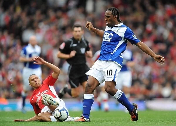 Intense Rivalry: Jerome vs. Gibbs Battle at Emirates Stadium (Birmingham City vs. Arsenal, Premier League 2009)