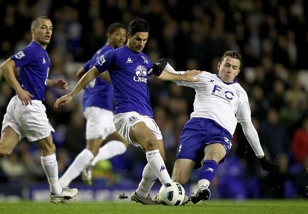 Intense Rivalry: Mikel Arteta vs. Jordan Mutch at Goodison Park, Barclays Premier League (09-03-2011)