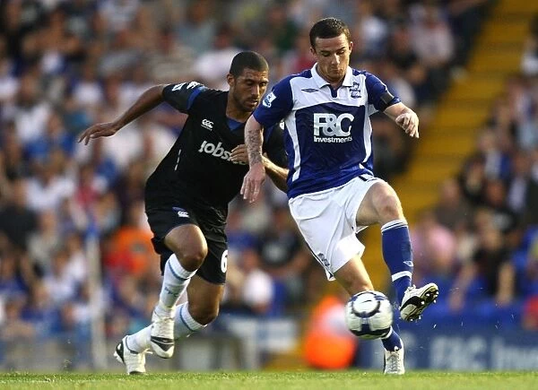 Intense Rivalry: Mullins vs. Ferguson's Battle for Supremacy - Birmingham City vs. Portsmouth (Barclays Premier League, St. Andrew's, 2009)