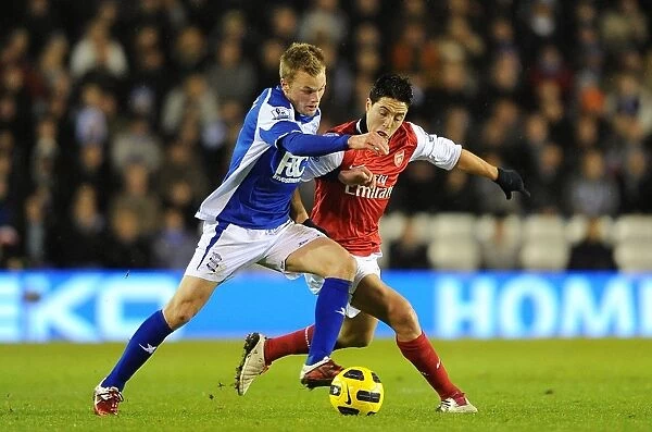 Intense Rivalry: Sebastian Larsson vs. Samir Nasri Battle at St. Andrew's (Birmingham City vs. Arsenal, Premier League, 01-01-2011)