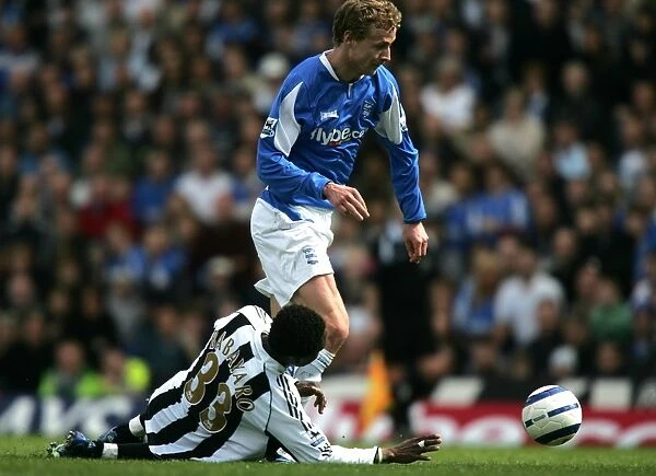 Jiri Jarosik Evades Celestine Babayaro: A Moment of Skill in Birmingham City vs. Newcastle United (FA Barclays Premiership, 2006)