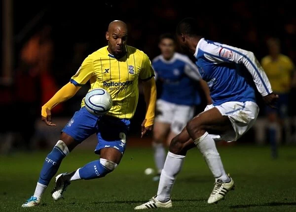 Marlon King Charges at Gabriel Zakuani: Intense Moment from Birmingham City vs. Peterborough United, Npower Championship (02-01-2012)