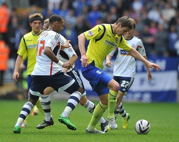 Nikola Zigic's Intense Battle for the Ball: Birmingham City vs. Bolton Wanderers in Sky Bet Championship