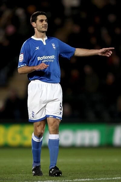 Pablo Ibanez: Birmingham City's Defender in Intense Face-off Against Hull City at KC Stadium (December 7, 2011)