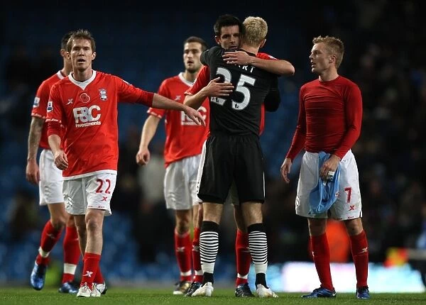 Scott Dann's Emotional Reunion: A Heartfelt Hug with Joe Hart after Birmingham City's Match against Manchester City (Nov 13, 2010)