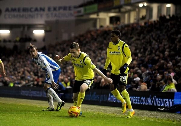 Shane Ferguson Crosses the Ball in Sky Bet Championship Clash against Brighton and Hove Albion