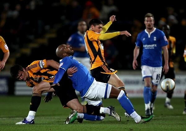 Tense Encounter: Marlon King vs Jack Hobbs in Birmingham City's Npower Championship Clash at Hull City (07-12-2011)