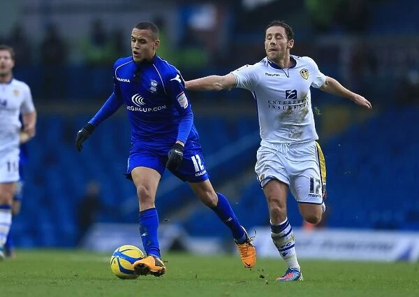 Tense Encounter: Michael Brown and Ravel Morrison Face Off Between Leeds United and Birmingham City during FA Cup Third Round