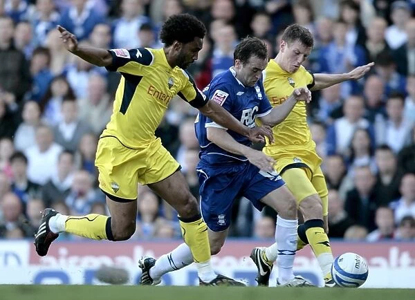Tight Battle: McFadden Surrounded by Mawene and Sedgwick (Birmingham City vs Preston North End, Championship 2009)