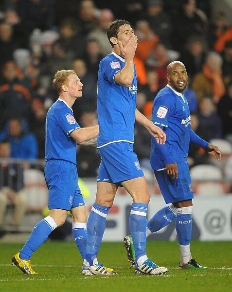 Triumphant Moment: Nikola Zigic Scores Birmingham City's Second Goal Against Blackpool (2011) with Chris Burke and Marlon King