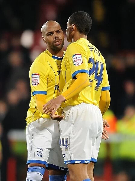 United in Determination: Marlon King and Curtis Davies Embrace Before Birmingham City's Battle Against Crystal Palace