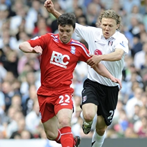 Battle for the Ball: Johnson vs. Bullard - A Premier League Showdown (Fulham vs. Birmingham City, 03-05-2008, Craven Cottage)